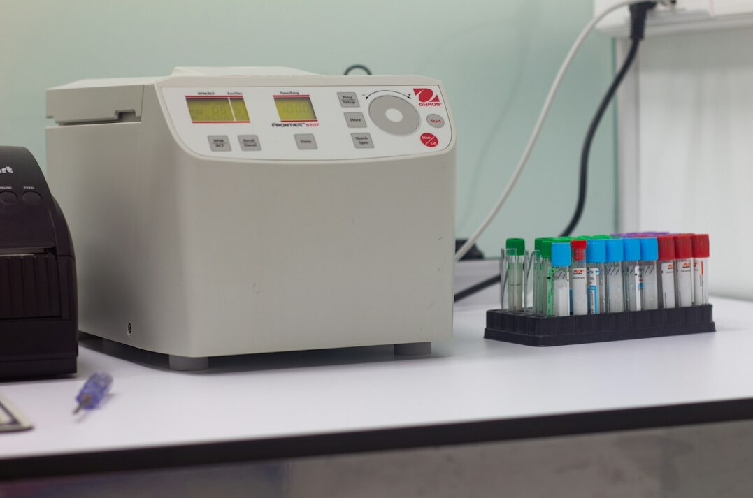 Medical laboratory test tubes and equipment on a bench