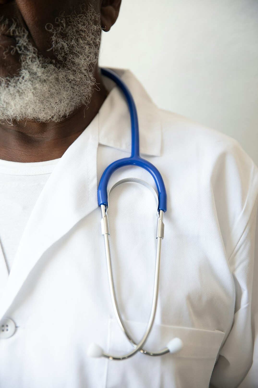 Portrait of a doctor in a white coat with a stethoscope